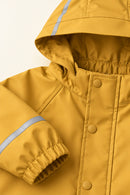 Puddle Raincoat in Mustard